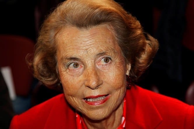 Liliane Bettencourt, heiress to the L'Oreal fortune, attends French designer Franck Sorbier's Haute Couture Spring-Summer 2011 fashion show in Paris in this January 26, 2011, file photo. Bettencourt's daughter Francoise Meyers-Bettencourt won control over her 88-year-old mother's business affairs on October 17, almost two years after she first asked to take over on the grounds her mother had been exploited. The decision was made on the basis of a medical examination, carried out following a surprise visit to the elderly billionaire's home in June, which concluded she was suffering from a form of dementia. REUTERS/Charles Platiau (FRANCE - Tags: FASHION BUSINESS HEADSHOT)